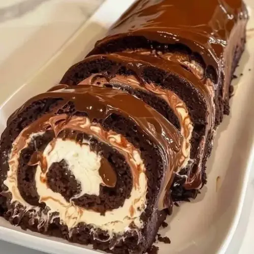 Delicious decadent chocolate cake roll with chocolate ganache filling