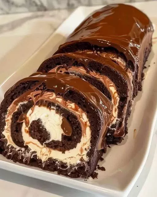 Delicious decadent chocolate cake roll with chocolate ganache filling