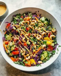 Vibrant Rainbow Veggie Salad with Toasted Cashews and colorful fresh vegetables